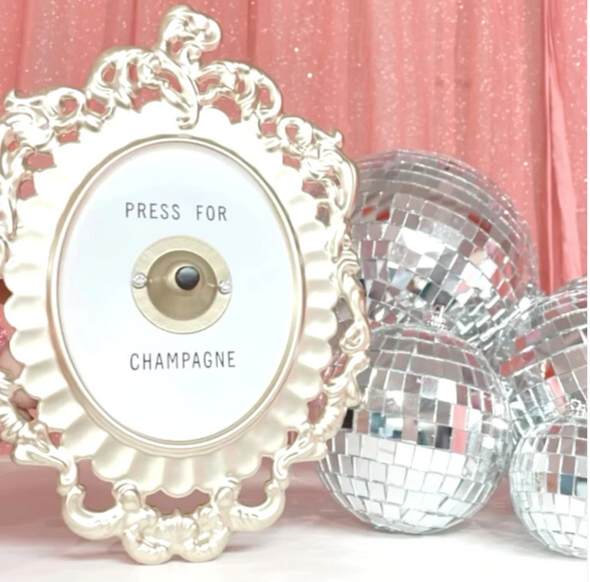 Press for Champagne Button