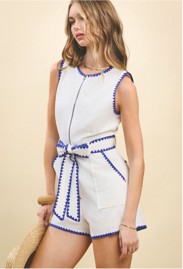 White Romper with Blue Triangle Stitch Detail